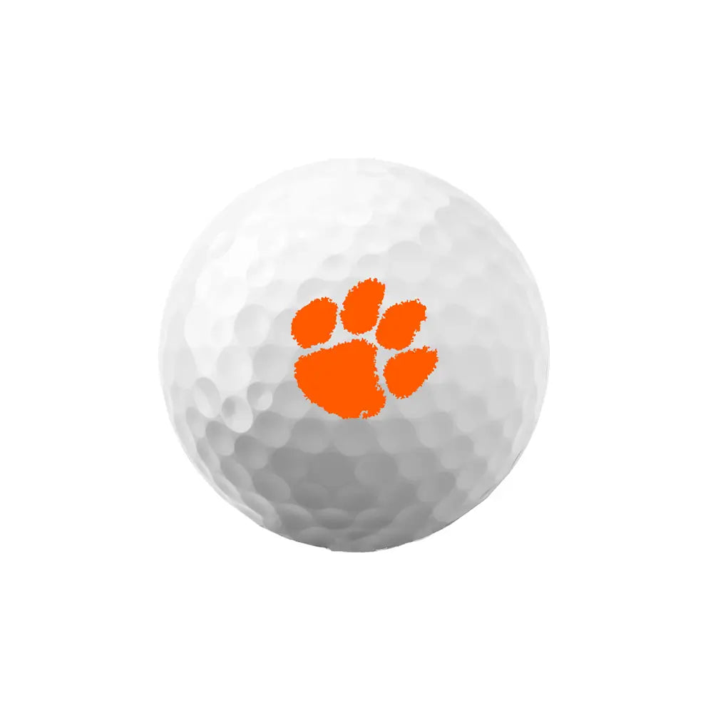 White golf ball with orange paw print Clemson logo on a white background