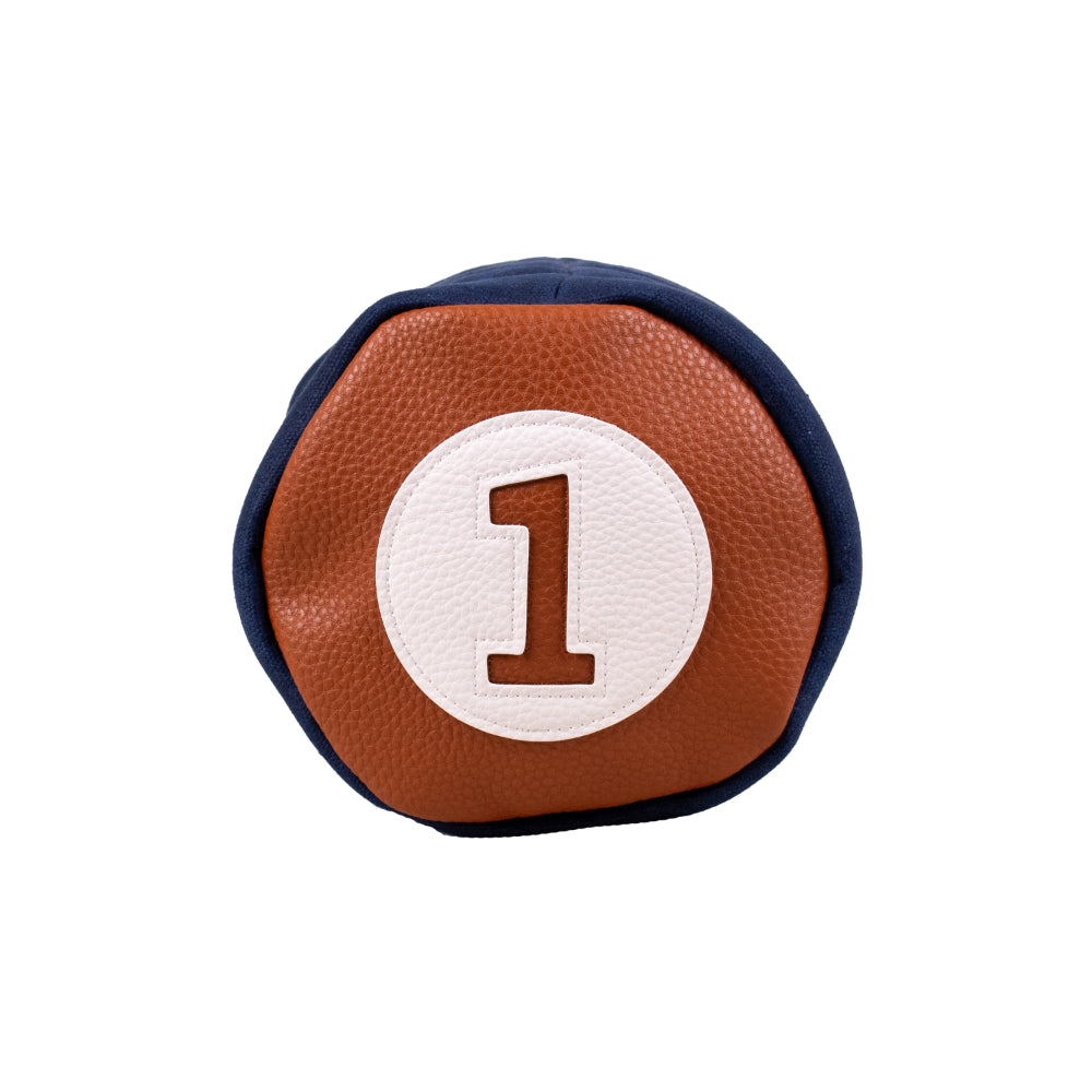 Barrel Driver Headcover, a round waxed canvas golf club headcover featuring a brown, textured surface with a central white circle containing the number one.