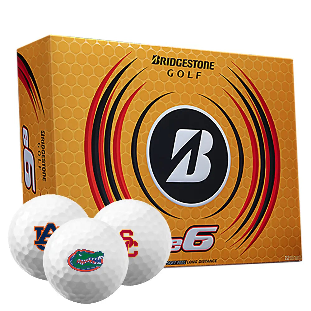 Bridgestone golf balls with college logos in front of a Bridgestone golf ball box