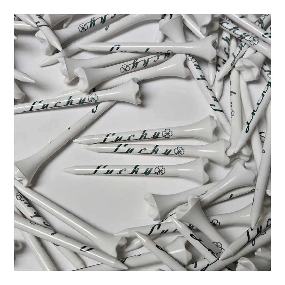 White golf tees with 'Lucky' text on a white background